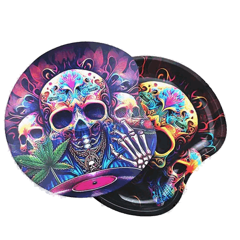 This image displays the BLUE Inferno Skull Rolling Tray With Lid, a small and striking accessory designed for rolling papers. The tray features a detailed and colorful artistic depiction of skulls, vibrant flames, and assorted intricate designs, creating a bold visual impact.