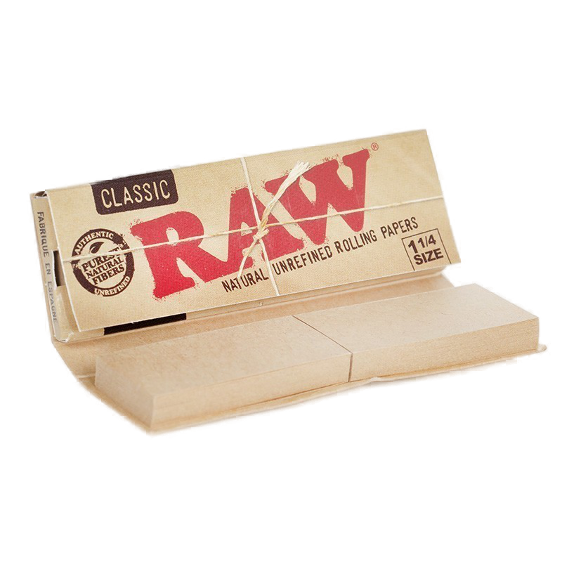 A pack of RAW natural unrefined rolling papers with tips, displaying the brand logo and product information.