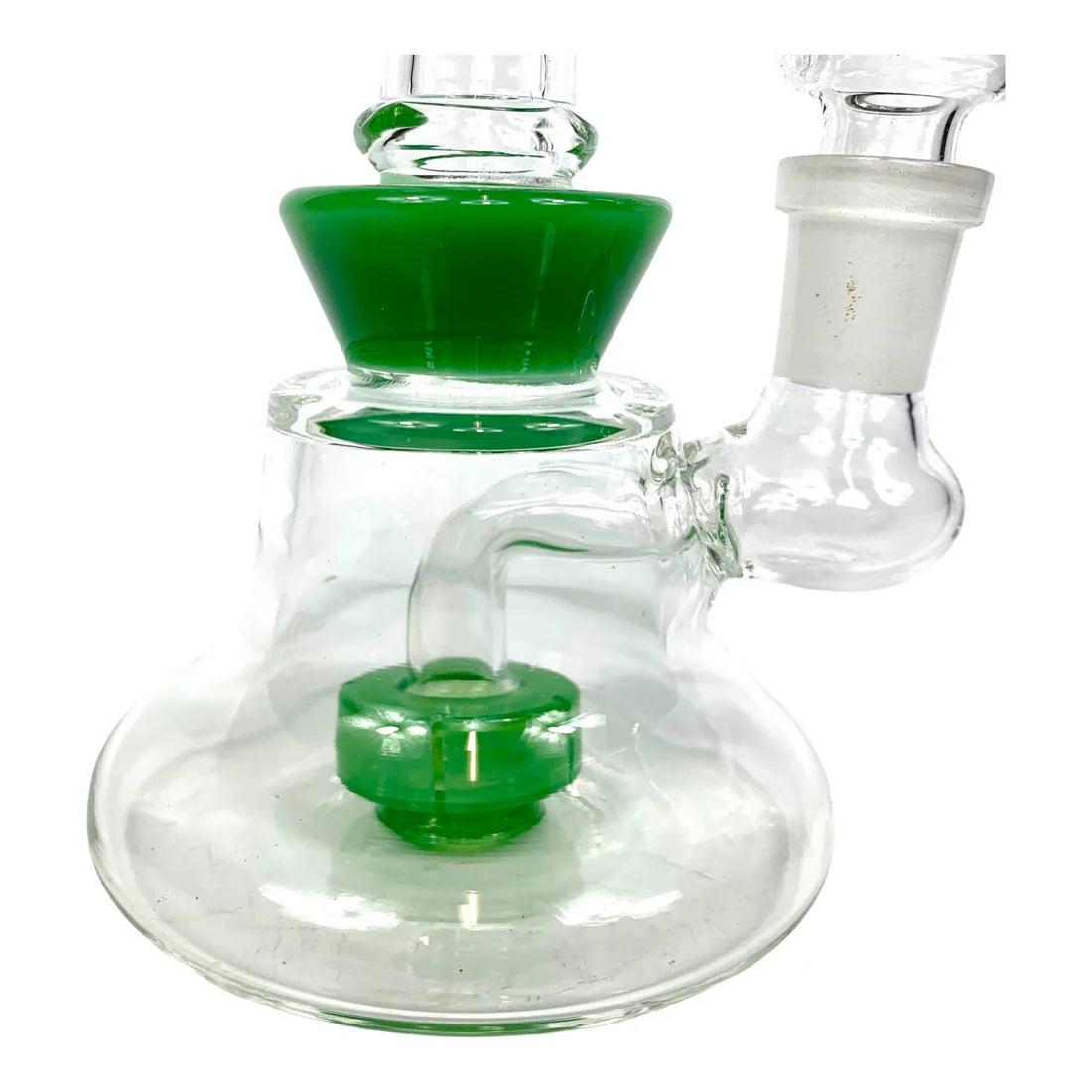 Glass apparatus with green liquid on a white background