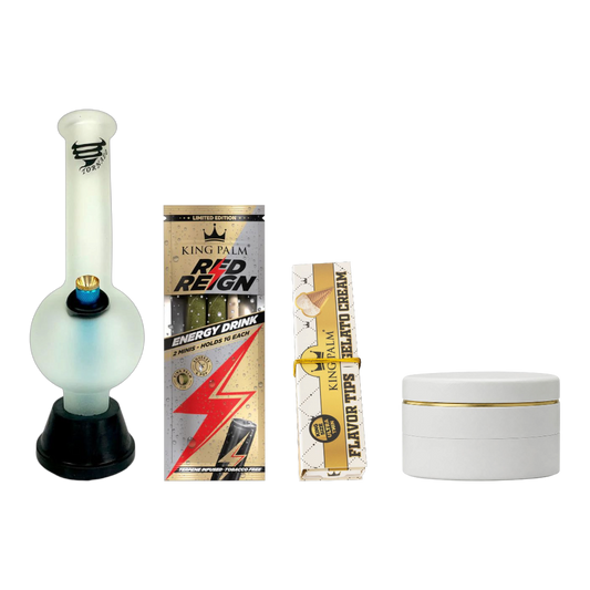 Collection of King Palm products including a glass pipe, energy drink box, and cream container on a white background.