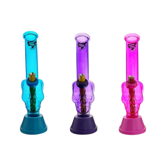 Three colorful skull-shaped bongs in blue, purple, and pink on a white background.