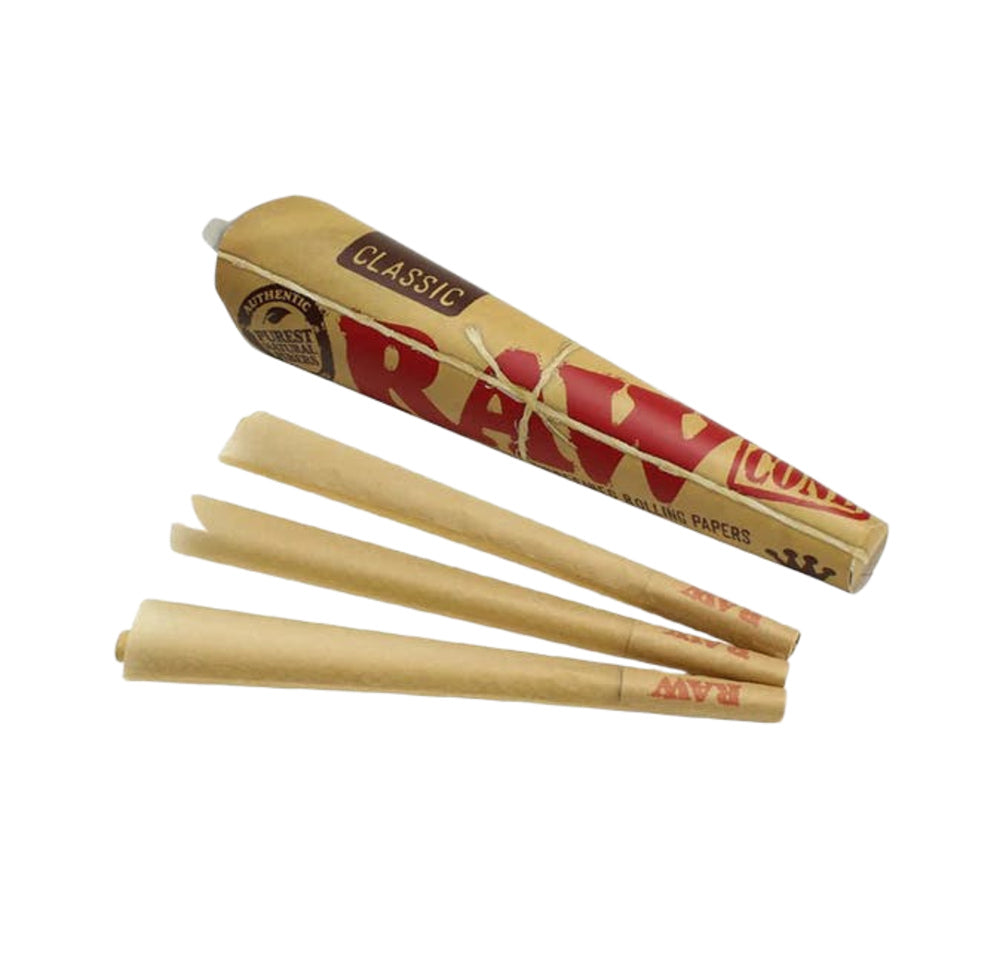 RAW rolling paper with three unrolled papers on a white background