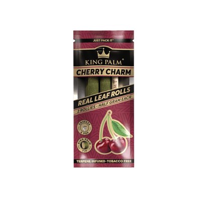 Packaging for KING PALM Cherry Charm real leaf rolls, with branding and cherry images, indicating flavor and tobacco-free properties.