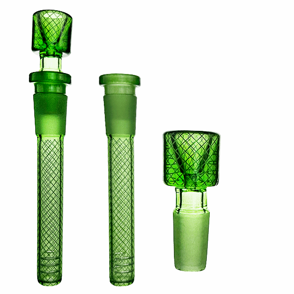 Three green glass smoking accessories on a white background