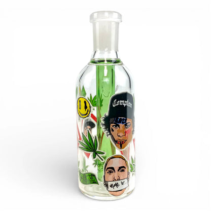 Clear glass bottle with artistic designs and text on a white background