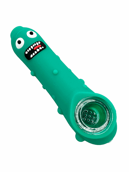 Green silicone pipe with cartoon face design on a white background