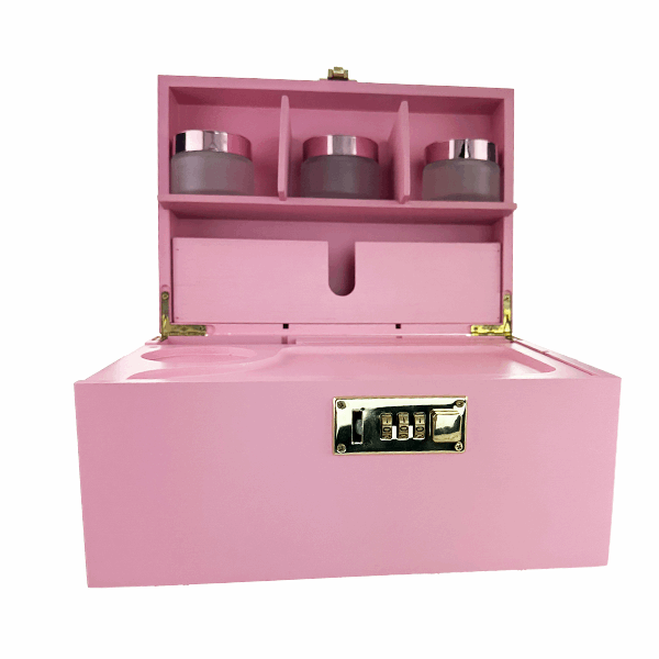Pink jewelry box with compartments on a white background