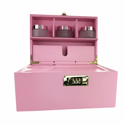 Pink jewelry box with compartments on a white background