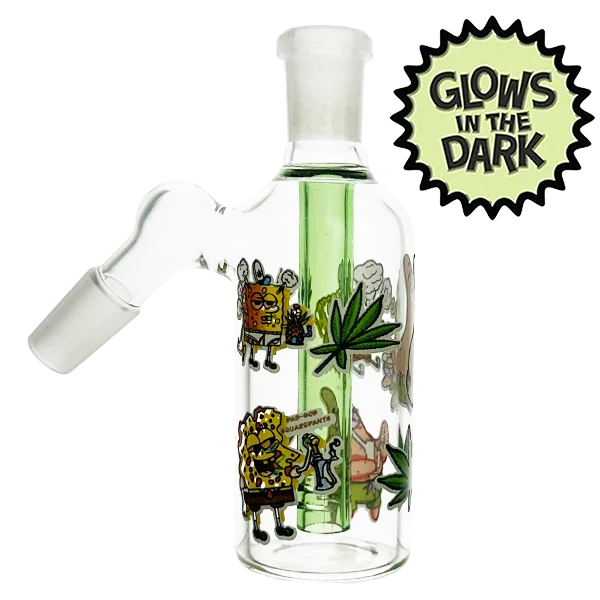 Glass smoking accessory with stickers and a 'Glow's in the Dark' label on a white background