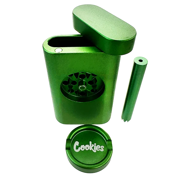 Green metal grinder with a 'Cookies' logo on a white background