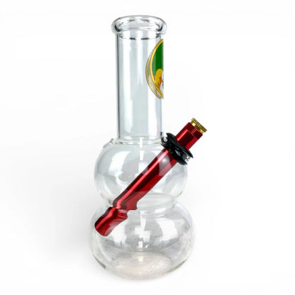 Clear glass bong with a red piece on a white background